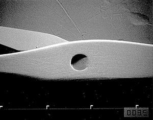 Needle surface after open-end yarn is knitted.(magnified 35x)